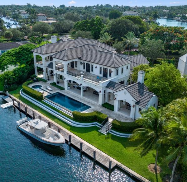 An eight-bedroom house with a pool and body of water at 9320 Gallardo St, Old Cutler Bay, Coral Gables, listed for $16.9 million