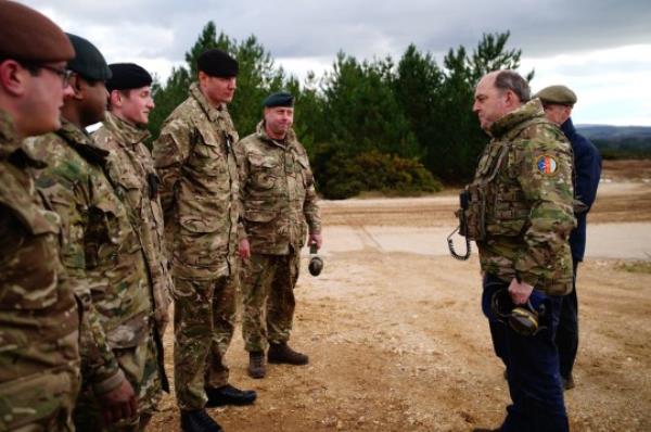 Defence Secretary Ben Wallace meeting the crew of an Ajax Ares armored perso<em></em>nnel carrier during a visit to Bovington Camp, a British Army military ba<em></em>se in Dorset, to view Ukrainian soldiers training on Challenger 2 tanks. Picture date: Wednesday February 22, 2023. PA Photo. Photo credit should read: Ben Birchall/PA Wire