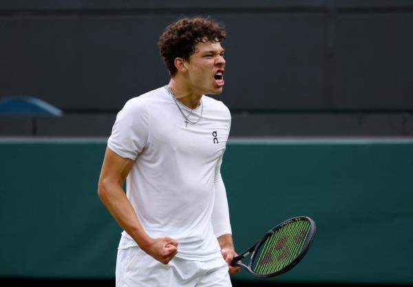 Ben Shelton of the U.S. reacts during his fourth round match against Italy's Jannik Sinner.