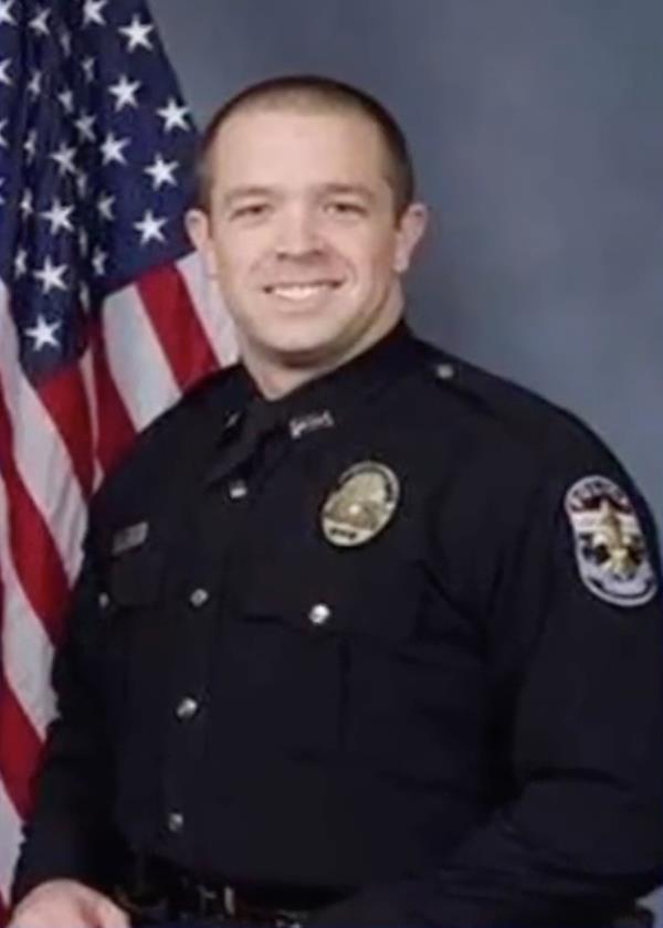 Officer Bryan Wilson is pictured.