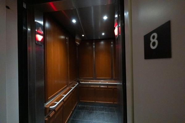 The teenage suspect is pictured being escorted by police officers from the 5th Precinct.