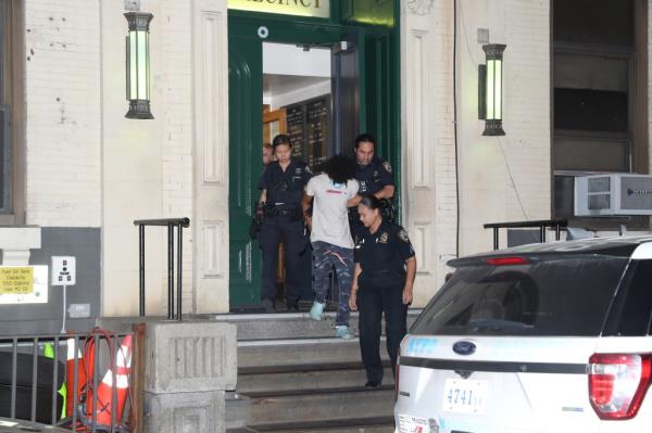 The teen suspect was charged with burglary, robbery and criminal possession of a weapon in the shooting death of Ying Zhu Liu, police said. 