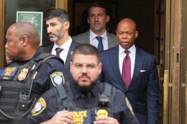 New York City Mayor Eric Adams walks outside federal court after his arraignment. 