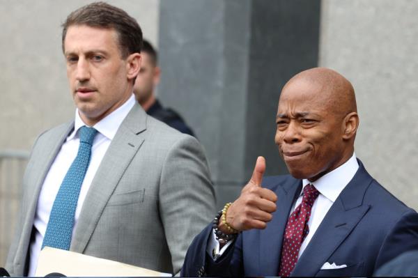 New York City Mayor Eric Adams gestures outside federal court, on the day of his arraignment after he was charged with bribery and illegally soliciting a campaign co<em></em>ntribution from a foreign national, in New York City, U.S. September 27, 2024. 
