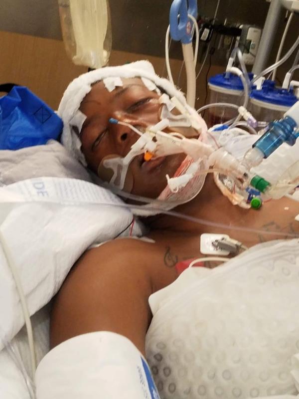 Elijah McClain lies in a hospital bed in Aurora Colorado in August, 2019.