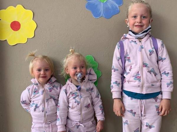 her two-year-old twin daughters Maya and Karla and their six-year-old sister Lianè.
