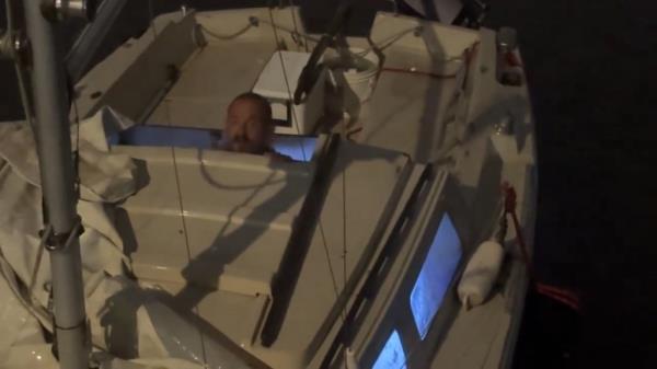 Malinowski was spotted on his small sailboat docked in Tampa Bay after riding out the hurricane into Thursday morning.