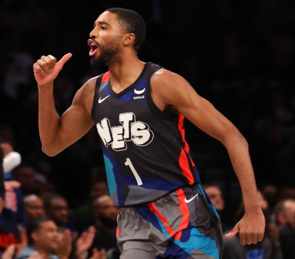 Mikal Bridges, who scored 42 points, celebrates after hitting a shot in the second half of the Nets' 129-101 win over the Magic.