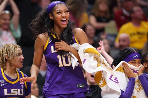 LSU's Angel Reese smiles during the NCAA women's basketball tournament natio<em></em>nal champio<em></em>nship in April 2023.