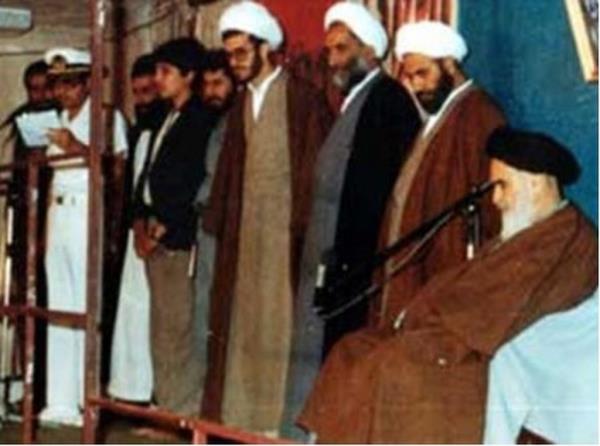 Imam Ali Elahi (in the center of the picture, the fourth man on the right) with the Supreme Leader of Iran, Ayatollah Ruhollah Khomeini.