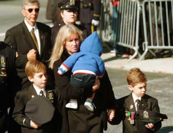 Cathy Vigiano with her three sons, Joseph, Jimmy and John on Oct. 31, 2001.