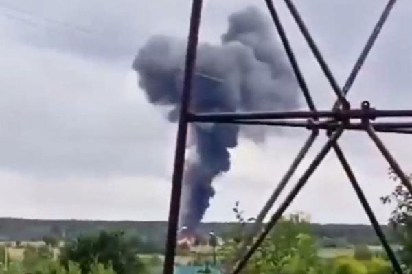 This video grab taken from a footage posted on a Wagner l<em></em>inked Telegram channel @grey_zone on August 23, 2023 and which can not be independetly verified by the AFP, reportedly shows a plane wreckage falling from the sky near the village of Kuzhenkino, Tver region. A private plane crashed in Moscow's Tver region and Wagner chief Yevgeny Prigozhin was on the list of passengers, Russian agencies said on August 23, 2023.