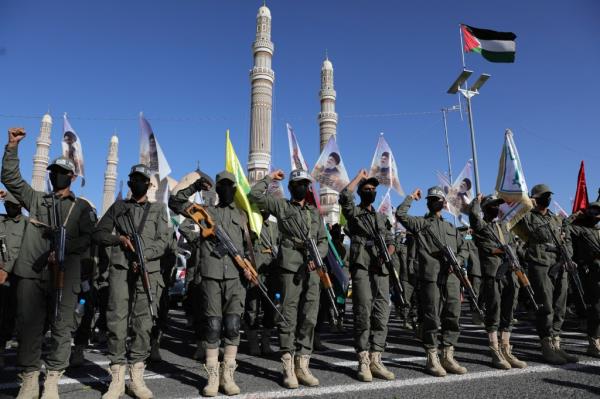 Newly recruited Houthi fighters stand during a rally to commemorate the late leader of Lebanon's Hezbollah, Hassan Nasrallah, and to show support to Palestinians in the Gaza Strip, in Sanaa, Yemen October 4, 2024.