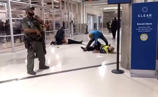 A woman stabbed three people, including officer, inside an Atlanta airport. 