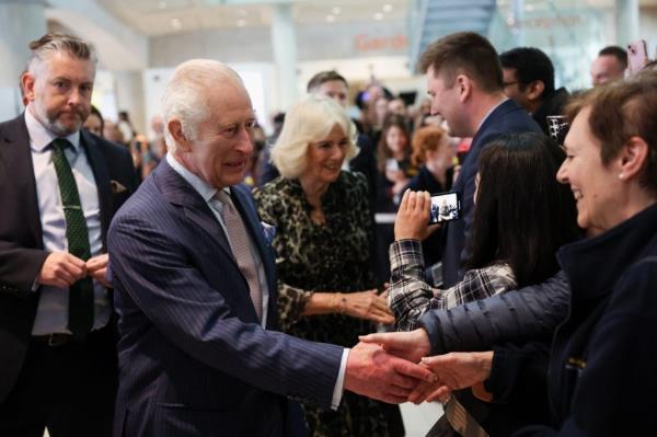 King Charles and Queen Camilla meeting staff members at the University College Hospital Macmillan Cancer Centre in London