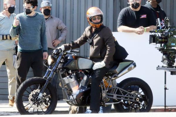 Brad Pitt is spotted filming a motorcycle commercial in the Eagle Rock neighborhood of Los Angeles on March 18, 2021.