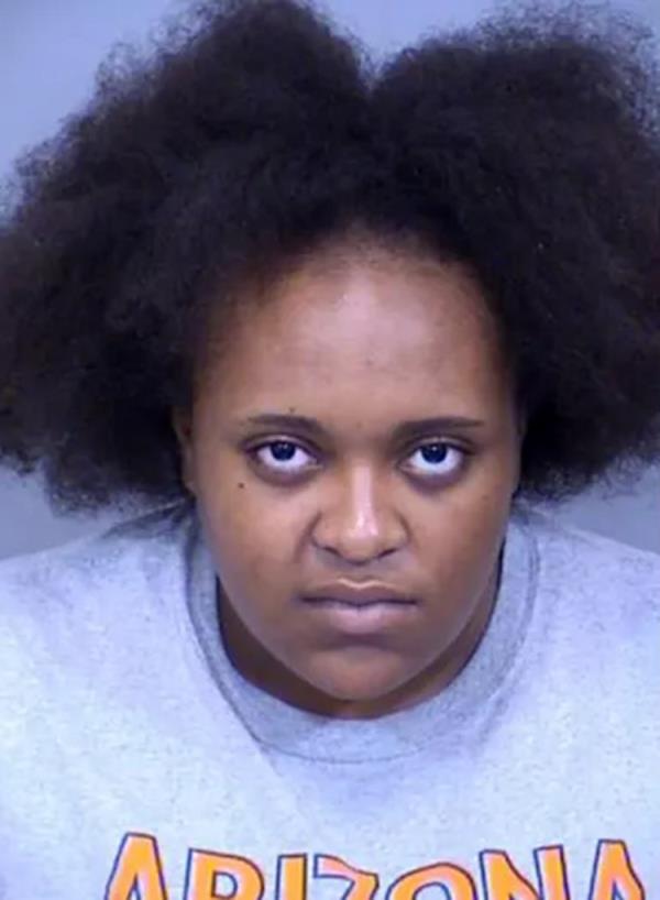 Kaci Sloan entered a not guilty plea after two of her four charges were dismissed.