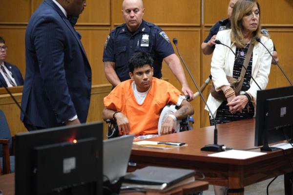 Bernardo Raul Castro Mata, 19, is wheeled into court, wher<em></em>e prosecutors said he admitted he's part of a dangerous Venezuelan gang smuggling guns into migrant shelters.