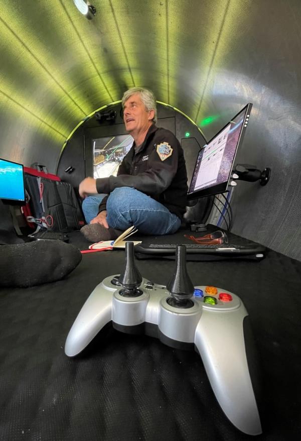 Stockton Rush in Titan, with a video-game co<em></em>ntroller in the foreground