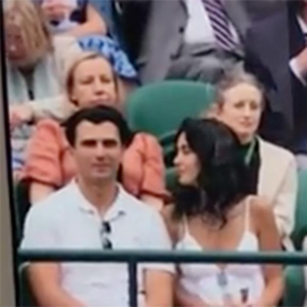  A couple taking in the action at the 2023 Wimbledon Champio<em></em>nships had Twitter buzzing over their PDA during Laurent Lokoli’s clash with Casper Ruud on July 3, 2023. 