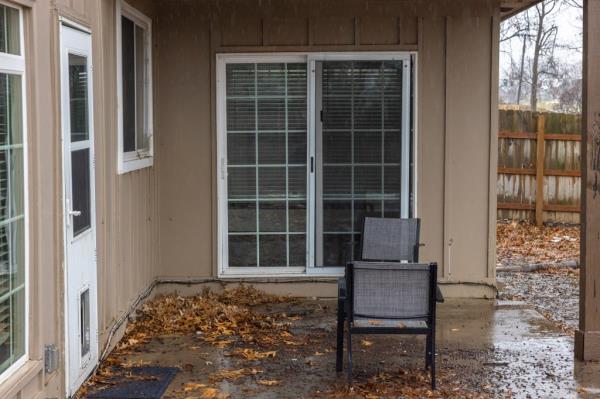 A photo of a chair on a backyard patio at the Jordan Willis home in Kansas City.