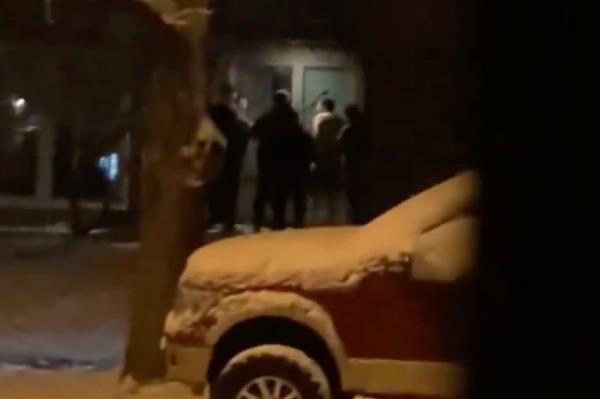 Neighbors and investigators outside snowy Kansas City home after 3 men found dead in the backyard days after watching a Chiefs game.