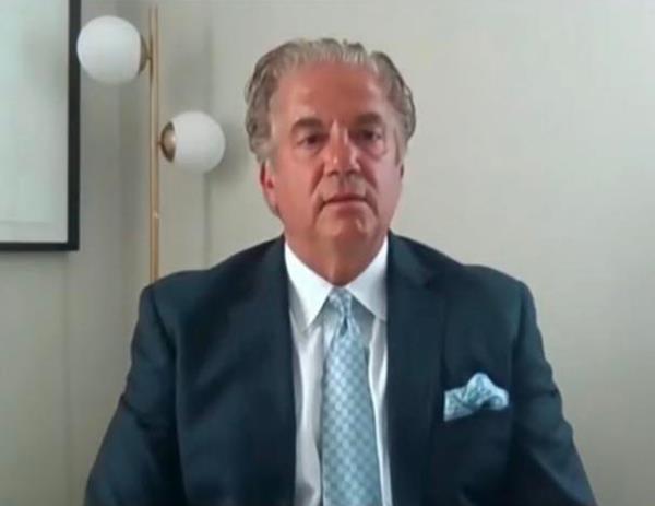 A photo of attorney John Picerno   wearing a suit.