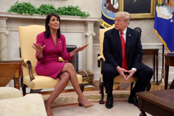 Outgoing U.S. Ambassador to the United Nations Nikki Haley havin<em></em>g a discussion with President Do<em></em>nald Trump in the Oval Office after her resignation