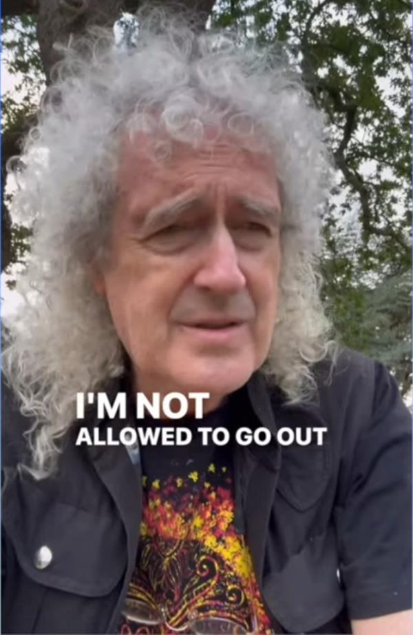 Brian May, 77-year-old musician with long white curly hair, revealing his recent stroke on social media