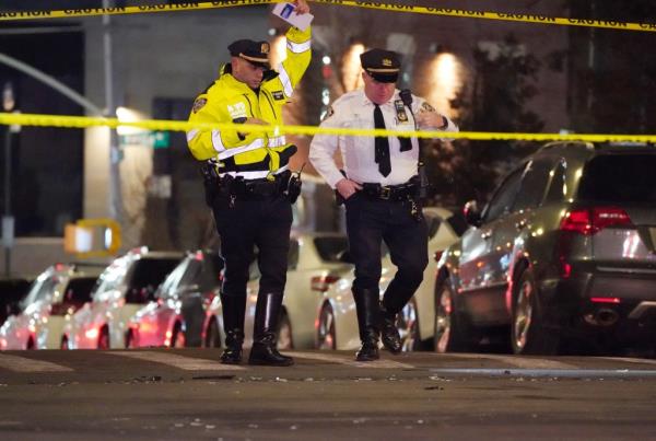 Cops survey the crash scene at Park Avenue and East 183rd Street in the Bronx.