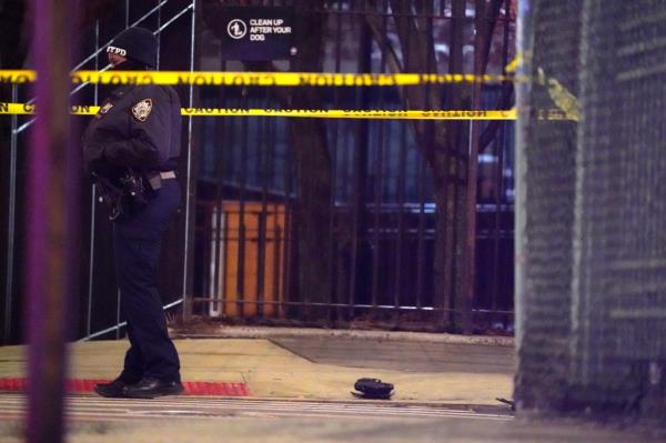 A police officer stands guard at the crash scene