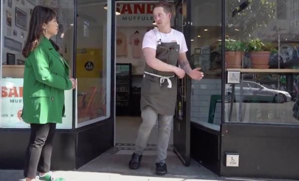 Harter reenacts the incident with a KTVU reporter in front of his shop.