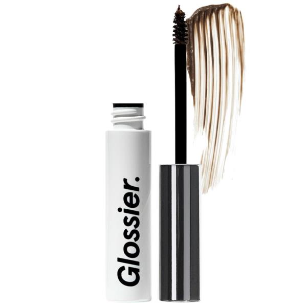 Glossier Boy Brow with wand removed from tube and a smudge of the product on white. 