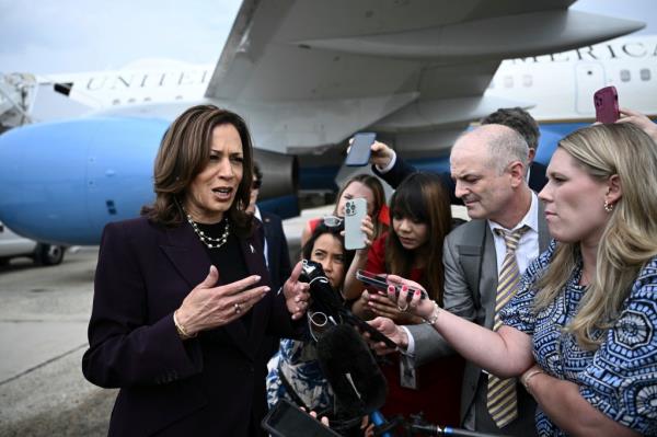 Harris speaks to reporters upon arrival at Andrews Air Force ba<em></em>se, Md., Thursday, July 25, 2024.