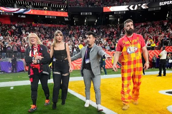 Do<em></em>nna Kelce, left, Taylor Swift, center, and Jason Kelce, right, celebrate after the Kansas City Chiefs beat the San Francisco 49ers i Super Bowl 2024 on Sunday, Feb. 11 in Las Vegas.  