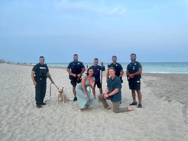 engaged couple with police