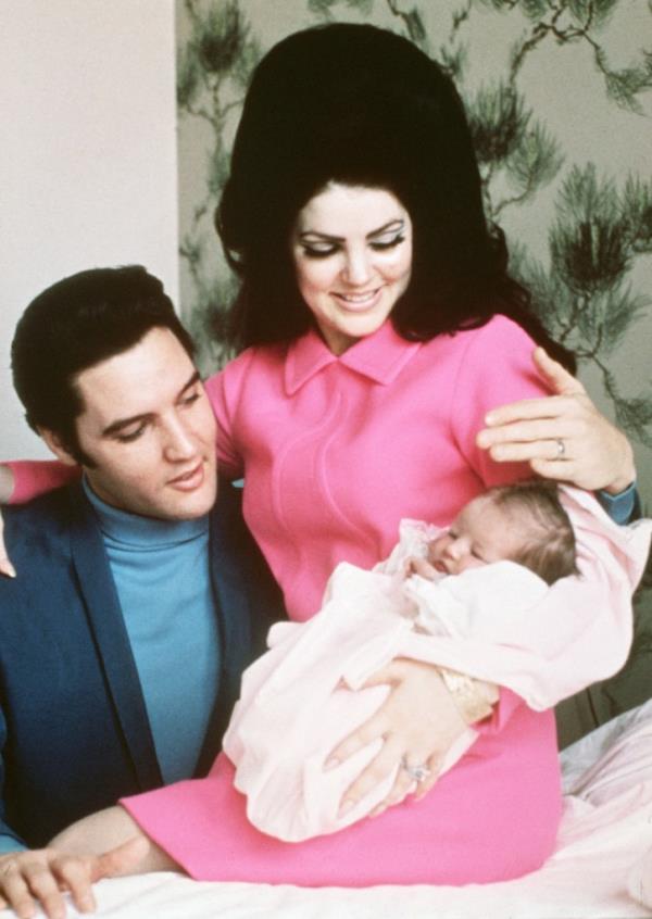Priscilla and Elvis Presley with their daughter Lisa Marie Presley in 1968.