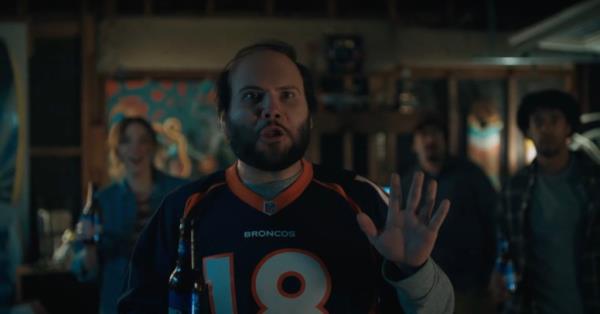 A man in a Bro<em></em>nco jersey appears in a teaser for Bud Light's Super Bowl ad.