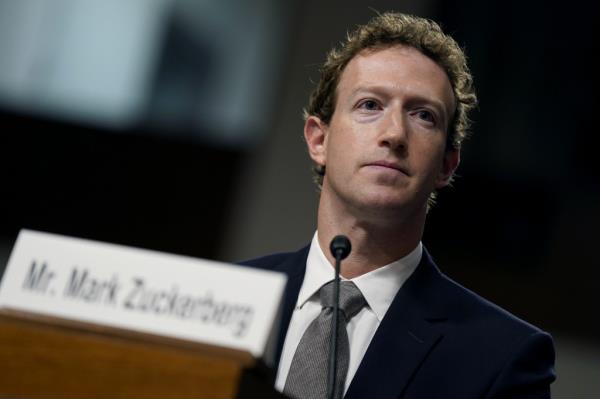 me<em></em>ta founder Mark Zuckerberg testifying at Congress.