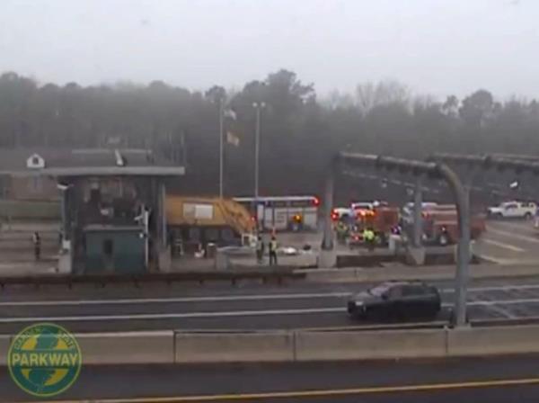 Police are still investigating the crash that left one toll collector in the hospital. 