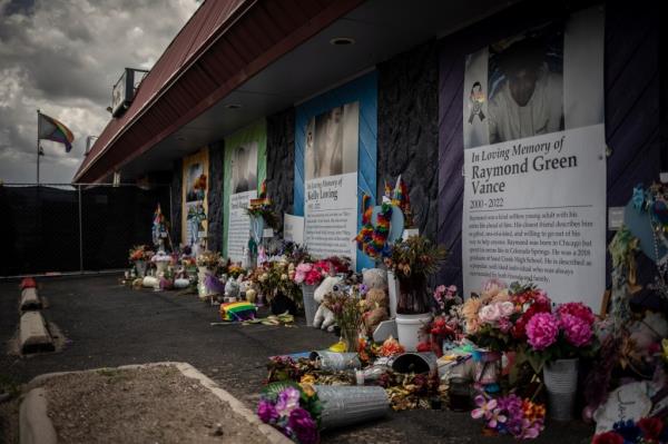 Memorials are displayed outside Club Q, the LGBTQ nightclub that was the site of a deadly 2022 shooting that killed five people in Colorado Springs.