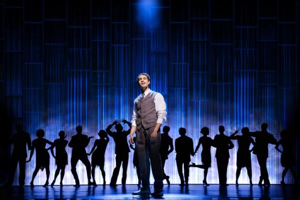 Noah J. Ricketts o<em></em>nstage with the cast