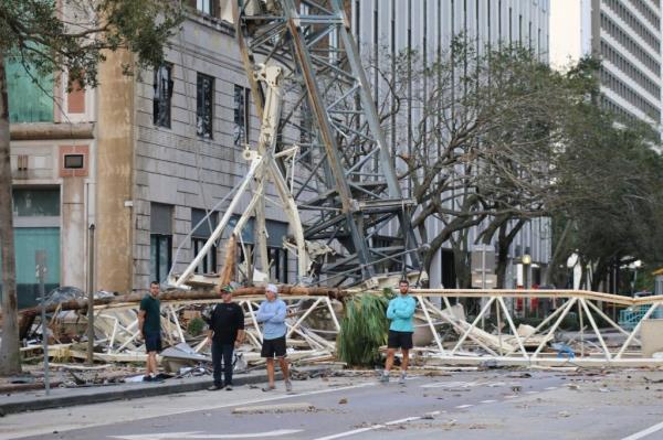 Fallen co<em></em>nstruction crane into the Tampa Bay Times headquarters office building due to Hurricane Milton, featuring Gary Dell'Abate, on October 10, 2024
