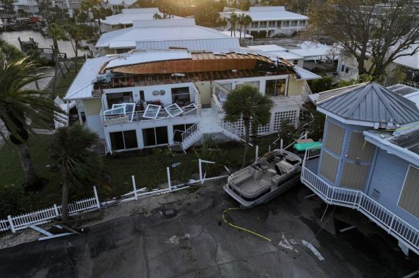 Drone view of buildings and structures in Venice, Florida damaged by Hurricane Milton on October 10, 2024