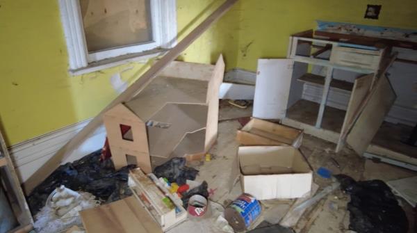 Children's toys are seen throughout the property. 