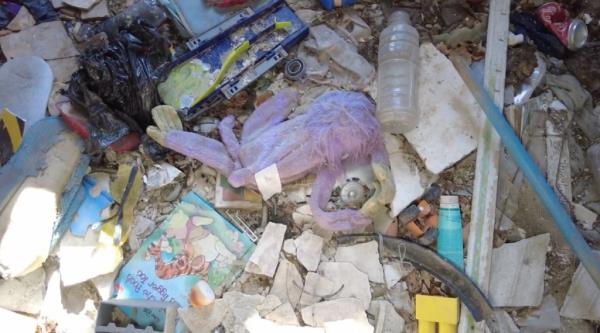 Lots of junk and children's toys left behind. 