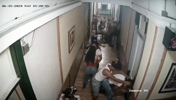 Surveillance footage shows partying in the halls of the since-shuttered Gateway hotel in El Paso, Texas.