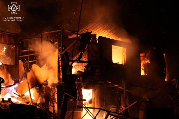 A fire burns through a building following a Russian attack in Ukraine's Odesa region on Dec. 27, 2023.