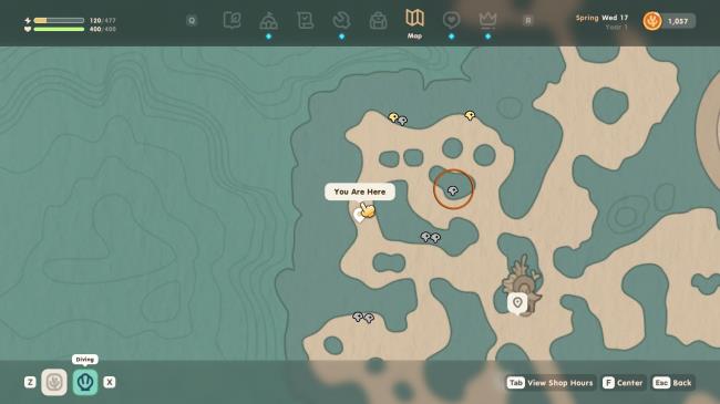 Coral Island avatar underwater in diving gear, near some dying coral. A small yellow lamp is circled in orange, to indicate that it's the solar orb.