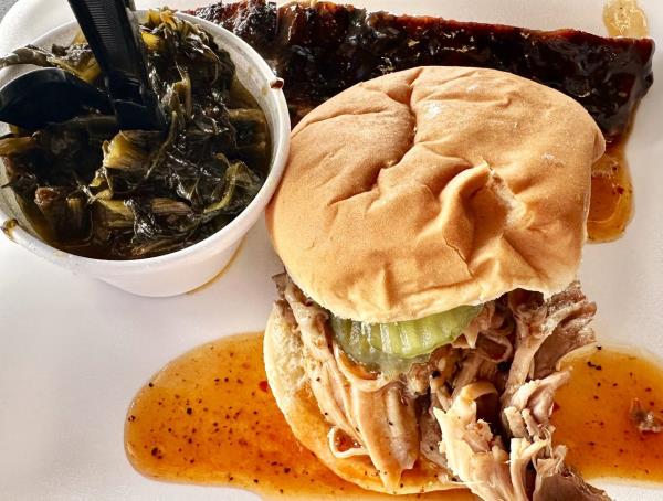 Owner Elbert Winfield tends to business in the kitchen at Saucy-Q Bar B Q on Government Street in Mobile, Ala. (Mike Brantley/mbrantley@al.com)